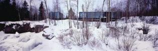 The homes two black volumes provide a strong contrast to the often-snowy landscape.