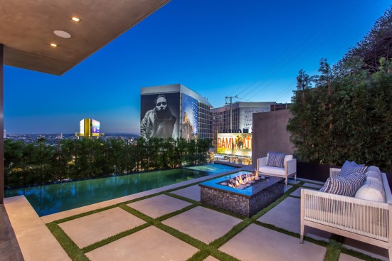 View toward Sunset Blvd. and the City light reflections in the swimming pool.