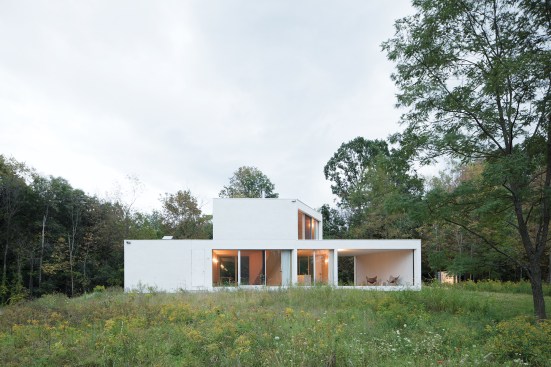 Two volumes create the house’s simple form, seen from the northwest.