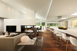 Remodel of Edina Mn residence, PK architects, Streeter and Associates, Andrew Flesher Interiors, ©Karen Melvin Photography, modern, contemporary, white, white kitchen, pizza oven, fireplace modern, monochromatic, woods, woodfloor, modern lamps, feather chandelier, feather pendant, poolside, Womb Chair, wire chair, remodel, remodel modern, architecture minnesota, AM cover
