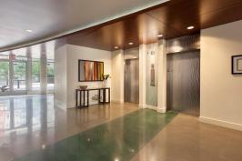 Elevator doors and transoms shown in Stainless Steel with Seastone finish and Campagne pattern at The Matisse, Portland, Oregon
