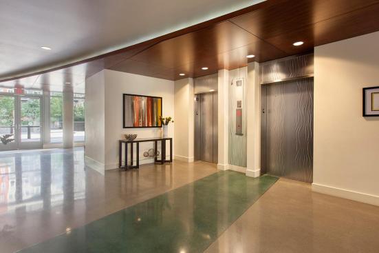 Elevator doors and transoms shown in Stainless Steel with Seastone finish and Campagne pattern at The Matisse, Portland, Oregon