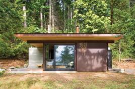 The cabins exterior skin will be allowed to weather naturally. Its back wall is made of rammed earth.