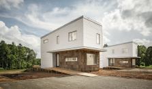 EcoMod recently completed two prefab houses in South Boston, Va. Sited side-by-side, the structures look nearly identical, but the one on the left is designed to Passive House standards—a challenge given the area’s hot, muggy summers and cold winters—while the other serves as a control house against which to compare building performance. Both use materials rated with the team’s system of radial charts  that quantify key project goals.