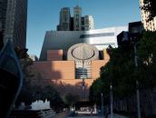 November 2011 rendering showing the addition from the west, with the existing Mario Botta-designed museum building in the foreground.