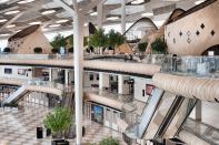 Autoban designed five types of cocoons, ranging from 305 square feet to 3,700 square feet in area, 20 feet to 34 feet in height, and 20 feet and 39 feet in diameter. One cocoon type contains two stories. The cocoon structures comprise a latticework of bent wooden beams slotted together. Some cocoon types leave the latticework structure exposed, allowing passerbys to see inside. Each open cocoons took two weeks for Ankara, Turkey–based contractor MAPA to construct. Laminated, diamond-shaped wooden panels that create a woven or scale-like appearance clad the other cocoon types; each enclosed cocoon took about three weeks to build. Some of the cladded forms taper into a point at the top while others are truncated on an angle.