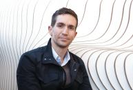 Kevin Toukoumidis, AIA, takes a break at the Wave, a dynamic bench in the city’s Southport Corridor neighborhood that doubles as almost anything else.