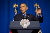 U.S. President Barack Obama speaks at the Organization for Economic Cooperation and Development Centre, in Paris, about the COP21 climate change summit. 