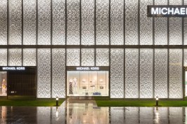 Narrow optic wall grazers are located at the top and
bottom of each panel and are coordinated with the reflector angles to create a
sense of depth using a pattern of light and shadows across the façade.