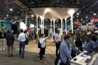 The Autodesk University convention hall featured numerous exhibits, including digitally fabricated pavilions, robot demonstrations, and virtual reality technology trials.