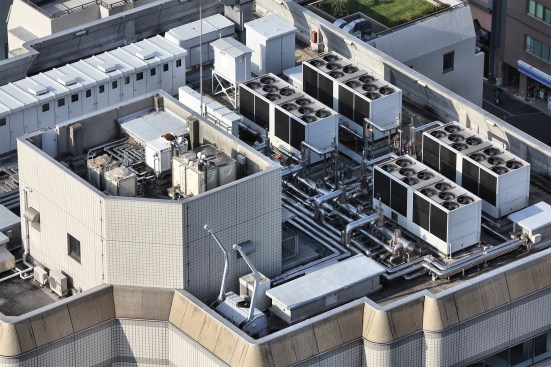 Industrial air conditioning and ventilation units on a Tokyo skyscraper.