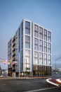 Carbon12, an eight-story condominium tower in Portland, Ore., features retail space, underground parking, and 14 residential units.