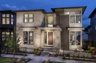 Infinity Home Collection's highly-dense Vive at Stapleton features indoor privacy walls and stacker doors for indoor/outdoor spaces.