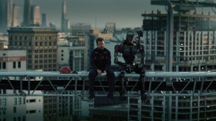 Caleb (Aaron Paul) and his construction sidekick
