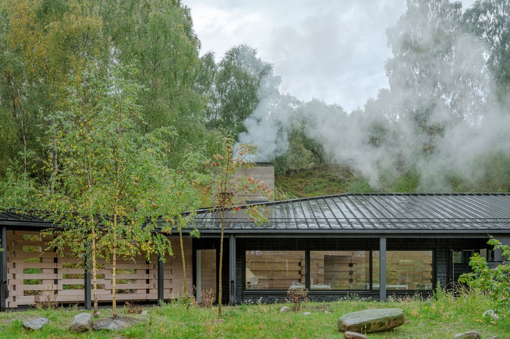The Douglas fir wall transitions from the covered walkway into Moxon Architects design studio.
