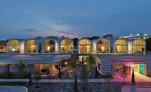 Designed by architect Marlon Blackwell, PS1200 is a mixed-use development with apartments, offices, a restaurant, a coffee shop and a gallery, all built from modified Quonset huts in Fort Worth, Texas.