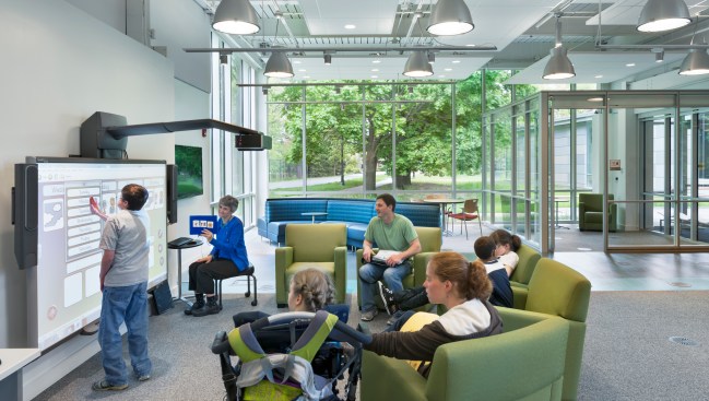 Technology in the student
center includes a smart
board, televisions with
video game consoles, computers,
handheld devices,
musical instruments and
radio equipment.