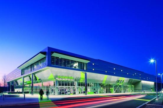 Kent Event Center LMN Architects took cues from its experience in theater design when programming the center, using lighting and supergraphics to choreograph the visitors' experience from the highway approach all the way through to reaching their seat for the game.