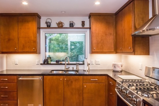 The back splash is white subway tile.