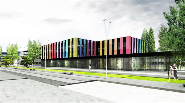 The new BI Building's colorful cladding offers a vibrant look to the school's remodeled former library
