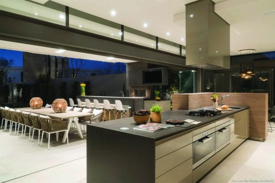 Dada kitchen opens up onto outdoor entertainment area