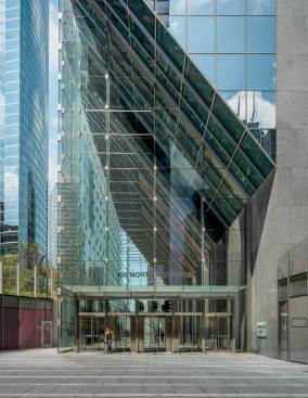 Main/South Entrance - The building's lobby is fully enclosed in highly transparent glass that blends the indoor and outdoor environments.
