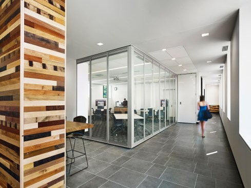 It can be closed in a glass partition for more formal lectures and presentations.