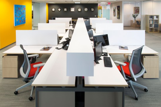 Knoll Antenna workspaces were selected for the open office area.