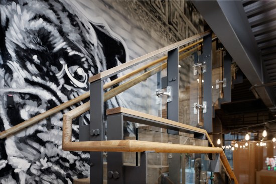 The stair features a combination of steel, wood and glass, where all the connections are celebrated.