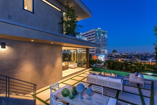 View toward Sunset Blvd. and the City light reflections in the swimming pool.