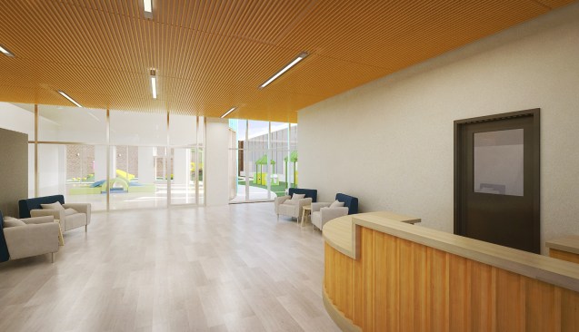 Interior view at the day care entry lobby with the motorskills room and outdoor play area beyond.