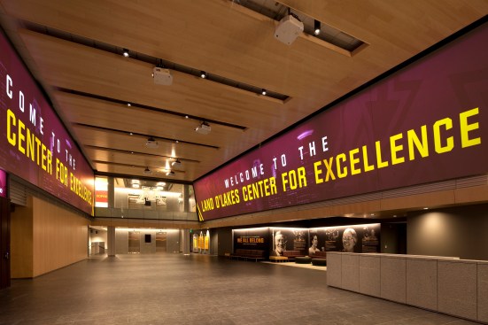 The main lobby of The Land O’Lakes Center for Excellence immerses visitors in a two-story
digital brand experience; the immense projector display is customizable by day and audience.