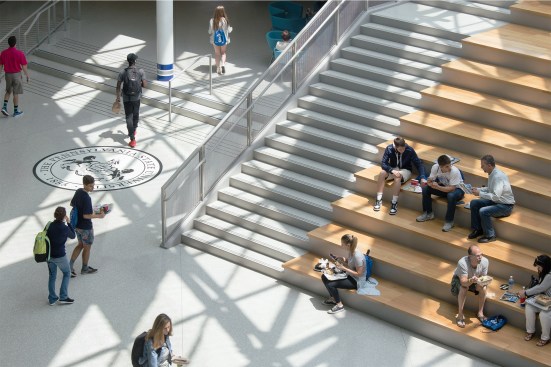 Students gather in the "Town Square" of the HUB