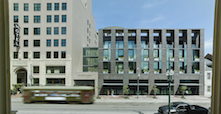 The 184,000-square-foot, mixed-use hotel and retail center is situated in the middle of New Orleans' Warehouse District at the corner of Carondelet and Lafayette Streets.
