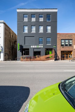 Exterior of building from directly across the street showing corten steel railing