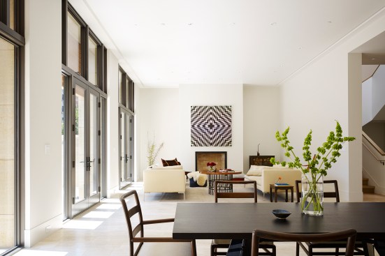 On the second floor, the 18-foot-deep living room spans the house’s full 40-foot width.