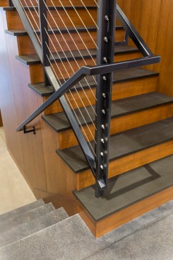 Red oak and Rich Lite stairs with black steel and wire railing
