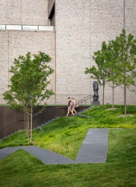 When the Guthrie Theater was demolished in 2007, what was left behind was a large open space that has become a gathering place for large museum events over the years. Petra Blaisse and Jana Crepon of Amsterdam-based firm Inside Outside worked with HGA to sculpt up a hill over the parking garage that both conceals the bulk of the new, low-slung, bronze-clad addition (seen from the garden to the west), and serves as the basis for a new landscape component on site. “That was a really important thing, to create a topography that would make a shape and a form and a presence as seen from the inside,” Blaisse says, “and also to tone down the scale of the surrounding buildings a bit.”