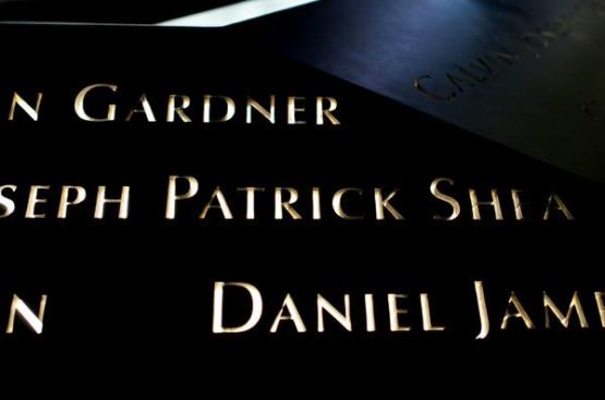 Narrow-profile 3500K LED luminaires backlight the names of the victims which are stencil cut in the bronze parapet that rings the two reflecting pools.