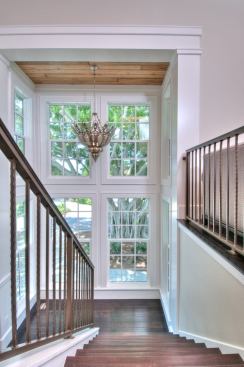 A giant ficus tree in the front yard effectively shades the home’s west elevation. Incorporating this existing element as part of the overall passive cooling strategy exemplifies the project's low-tech green focus. “The client was interested in being as green as possible, without adding systems that might require additional maintenance,” Wynne says.