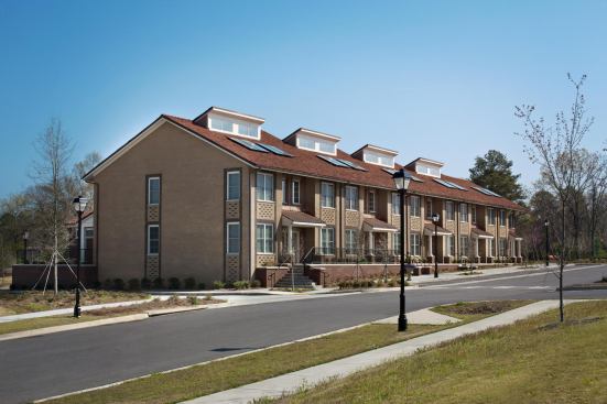 A north/south site orientation maximizes daylight and minimizes solar gain. South-facing roof monitors provide light for the stairwells, and north-facing roof monitors harvest daylight for the bathrooms, reducing the need for electricity during daylight hours.
