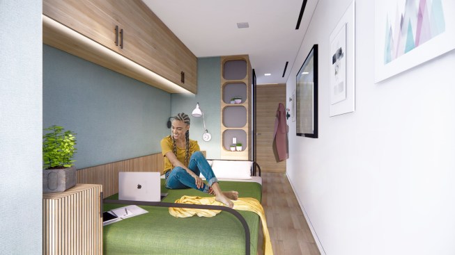 The staff housing block features single- and double-occupant rooms complete with their own bathroom, a fold-out balconey, and fold-up bed.