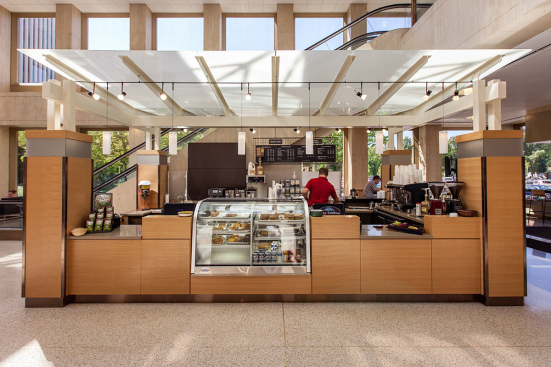 Coffee kiosk accents in ViviChrome Chromis glass with Taupe interlayer and Opalex finish; kiosk roof in ViviGraphix Graphica glass with Silkworm interlayer and Standard finish at Lloyd Center Tower, Portland, Oregon