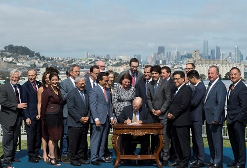 Gov. Jerry Brown signs a package of 15 housing bills in San Francisco.