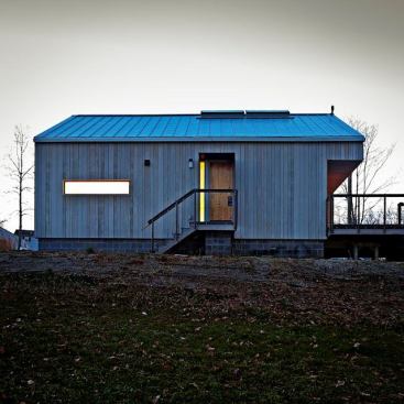 The compact shell and simple form of the New Norris House was designed for off-site manufacture.