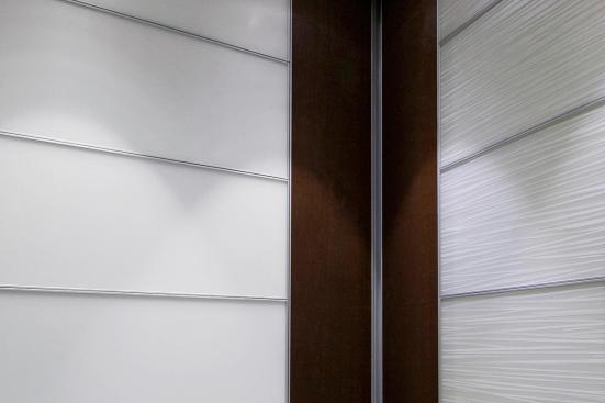 LEVELe-102 Elevator Interior with rear wall main panels in ViviGraphix Graphica glass with Cairo interlayer and Standard finish; side wall main panels in ViviChrome Chromis glass with White interlayer and Opalex finish; accent panels in American Cherry with Dark Mahogany Stain wood veneer at Sallie Mae, Newark, Delaware