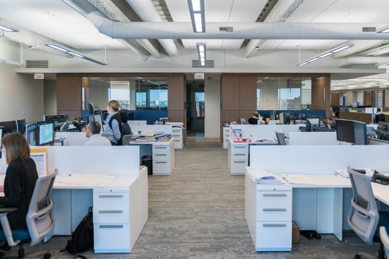 The design team specified pendants with 85-percent indirect illumination to give the impression of a more voluminous space.