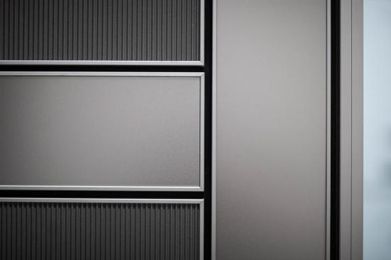 LEVELe Wall System with Capture panels; insets in Bonded Aluminum with Dark Patina and Delta pattern and Stainless Steel with Seastone finish at 101 Capitol Centre, Jackson, Mississippi