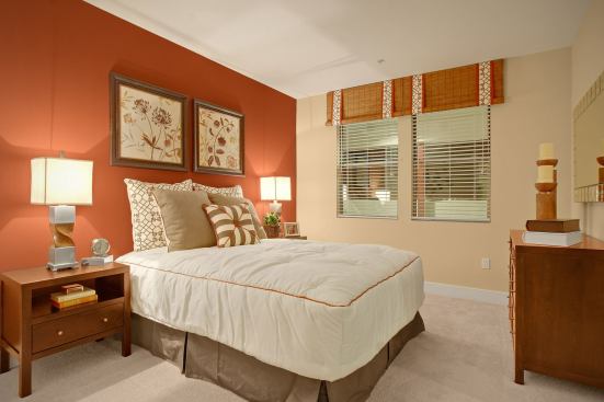 Bedrooms at the Crossing offer spacious walk-in closets and mirrored wardrobe doors.