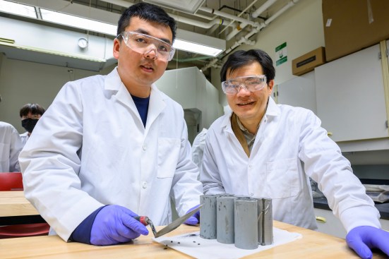 WSU graduate student Zhipeng Li and professor Xianming Shi with their carbon-negative concrete samples